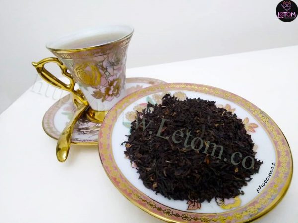 Organic black tea in a cup