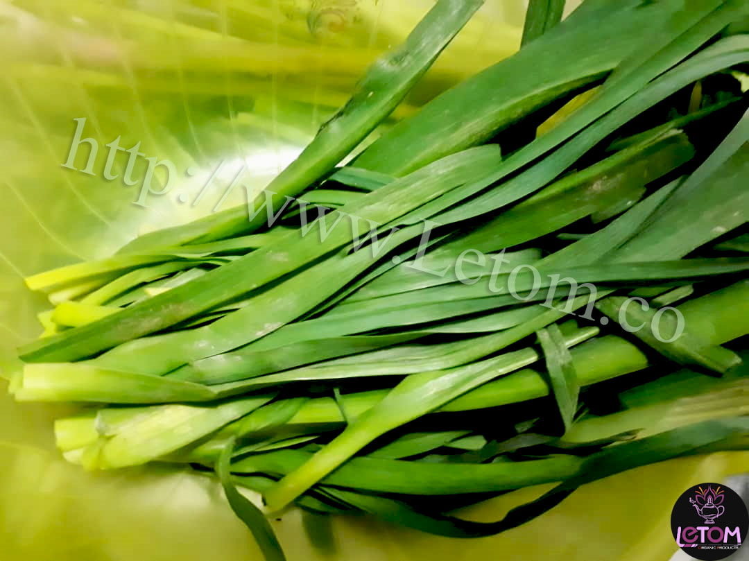 A few bunches of the best organic leeks on the table