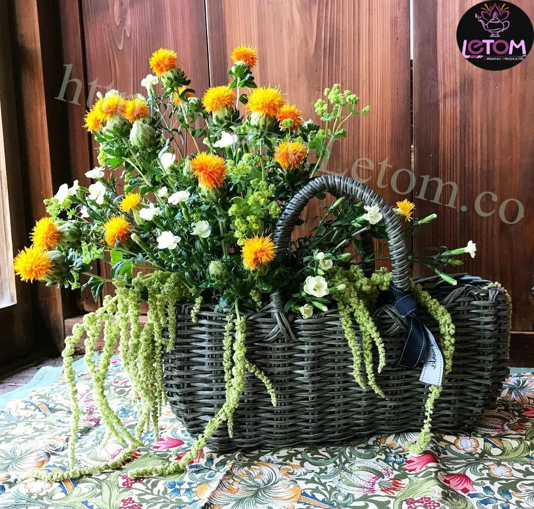 Dried safflower branches in a basket