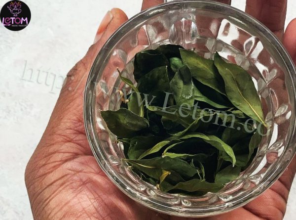 Organic henna leaves in a bowl