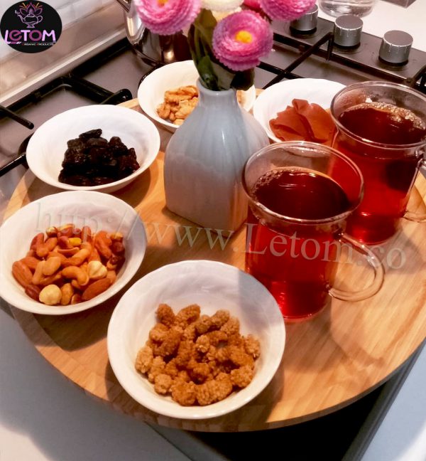 The best dried fruits with black tea on a tray