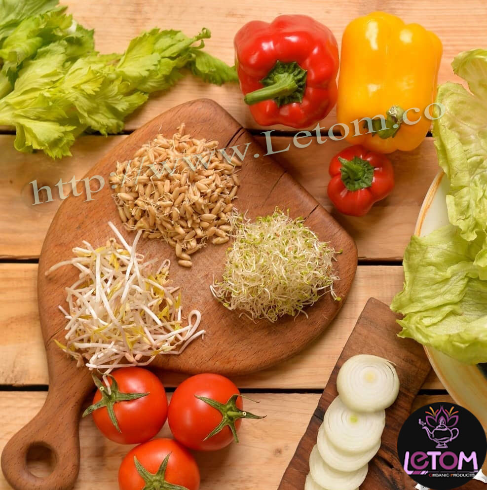 A photo of fresh and organic vegetables next to wheat germ